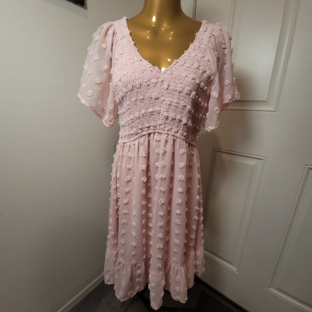 Elegant Pink Midi Dress with Textured Detail